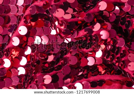 Pink sequins fashion fabric shine on blur background