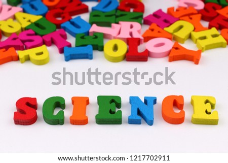 The word science with colored letters