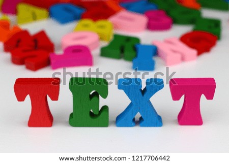 The word text with colored letters