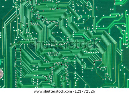 Close up of a printed green computer circuit board Royalty-Free Stock Photo #121772326