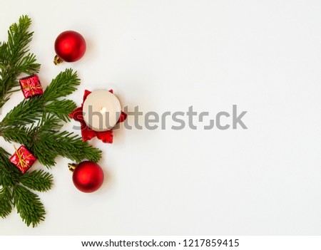christmas frame with pine branches and candle and space to write
