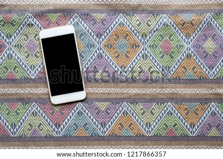 blank screen on smartphone, mobile, cell phone for text with abstract vintage texture background.
