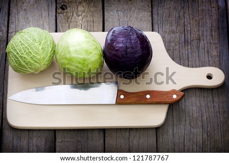 Cabbage and knife on cutting board preparation for cooking