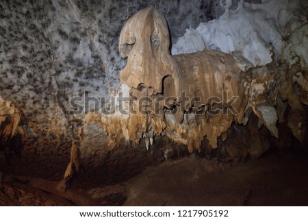 Inside the cave in nature nobody with stalagmites and stalactites in Thailand.