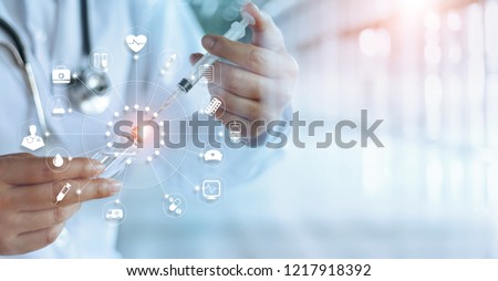 
Medicine doctor and vaccine dose flu shot drug syringe in laboratory with icon medical network connection on virtual interface, microbiology and pharmaceutical research, medical and healthcare.
