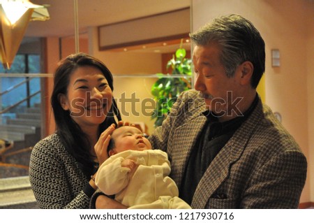 grandfather  daughter and granddaughter Royalty-Free Stock Photo #1217930716