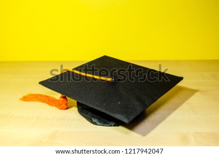 A graduation mortarboard or graduation hat for undergraduate convocation Royalty-Free Stock Photo #1217942047
