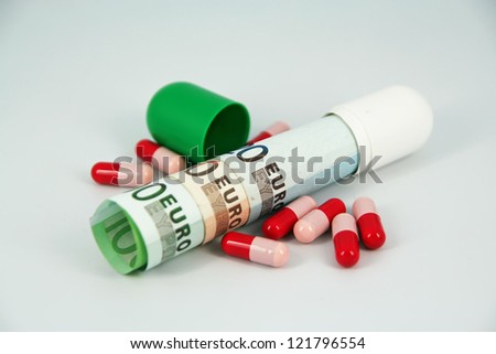 Medical pills and european currency. Cost of medicine. Health care cost. Corruption in medicine.
