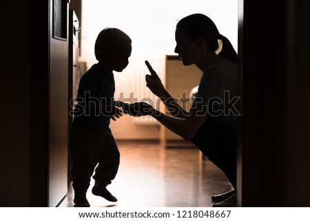 Mom disciplining her child. Teaching-parenting your kid concept.  Royalty-Free Stock Photo #1218048667