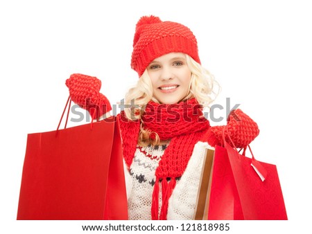 picture of  young girl with shopping bags..