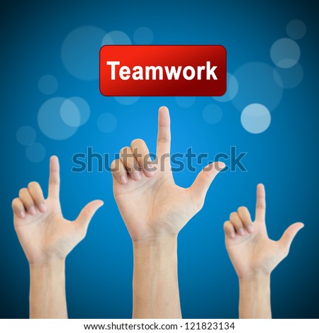 Teamwork. hand man pressing teamwork button.