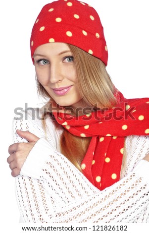Portrait of the beautiful teenage girl wearing warm winter clothing