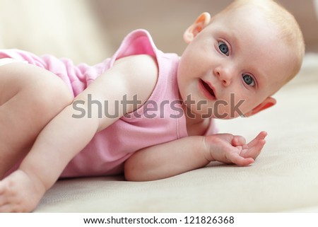 Picture of a baby lying in bed