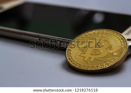 Cryptocurrency Bitcoin Ethereum Smartphone selective focus