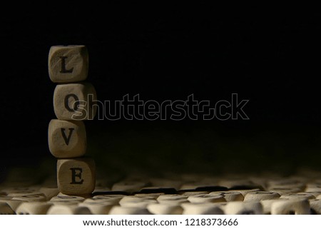 cubes letters love inscription / message from small letters, the concept of romance love, inscription love unusual font