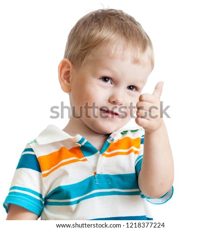 little child boy giving you thumbs up, isolated