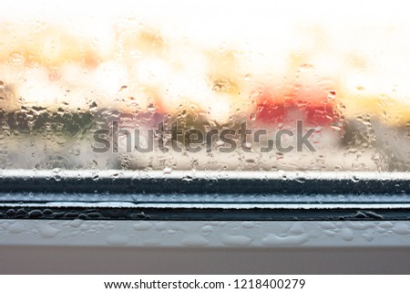 Background photo of increased condensation on the glass, water droplets on the windows, horizontal view, high quality and detail