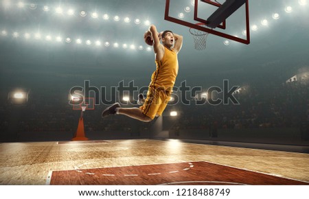 Layup shot. Basketball player on professional court