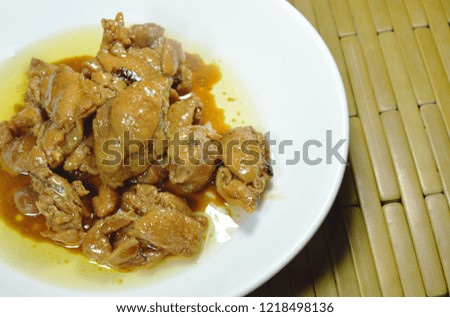 fried chicken with sweet soy sauce on dish