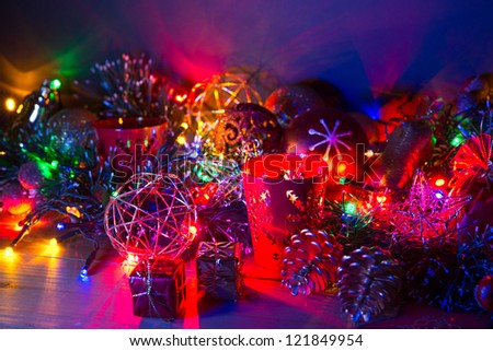 Christmas decoration with candles over dark background