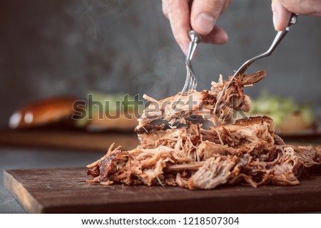 Home made pulled pork ready to be eaten Royalty-Free Stock Photo #1218507304