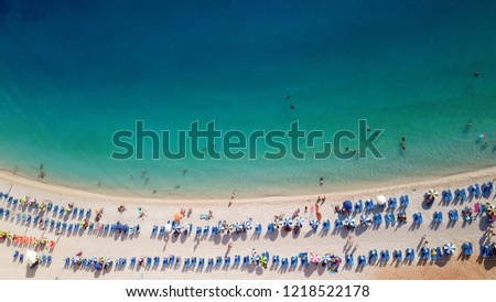 Aerial drone photo of tropical mediterranen exotic sandy beach with white rocky seascape and beautiful turquoise clear sea