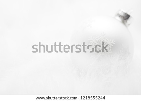 Snowflake Christmas Ornament on Snowy Background