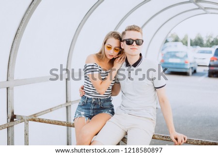 Close up portrait of a young loving stylish hipster couple have fun outdoor in city street 