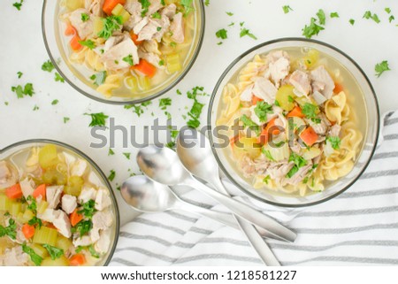 Bowls of Chicken Noodle Soup with Vegetables