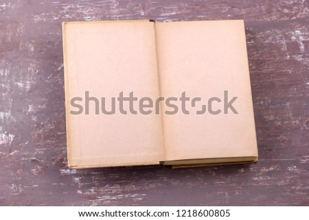 open book with blank sheets top view brown shabby background