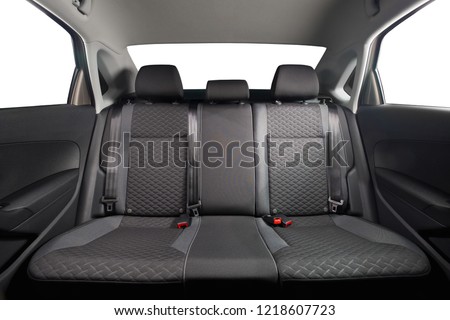 New car inside. Clean car interior. Black back seats in sedan. Car cleaning theme. Royalty-Free Stock Photo #1218607723