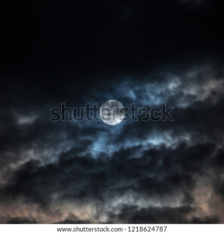 Night clouds and the moon