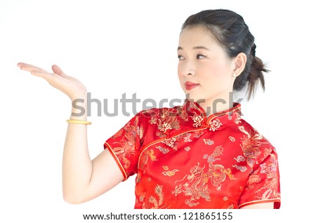 Asian Chinese woman in Traditional Chinese Cheongsam gesturing