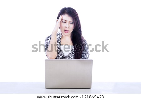Picture of beautiful woman stress out while working with her laptop