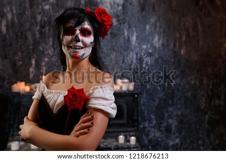 Halloween photo of smiling zombie woman with makeup