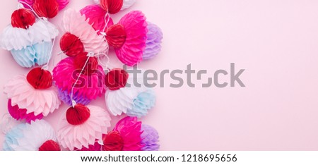 Paper cupcakes garland on pink background. Party and celebration concept. Fits great for your any project! Horizontal, wide screen banner format