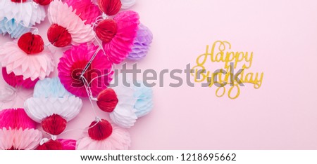 Paper cupcakes garland and happy birthday lettering on pink background. Party and celebration concept. Fits great for your any project! Horizontal, wide screen banner format
