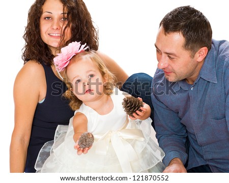 the father, mother and the 2-year-old daughter in studio isolated