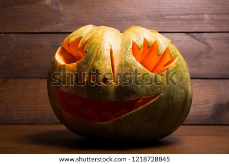 halloween concept. halloween pumpkin on wooden background. pumpkin carving