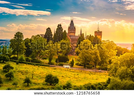 Beautiful sunset landscape with Schloss Drachenburg Castle in Konigswinter on the Rhine river near the city of Bonn in Germany