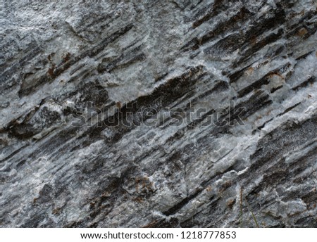 Roughly surface, black and white granite stone texture background