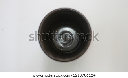 black old cup on white background