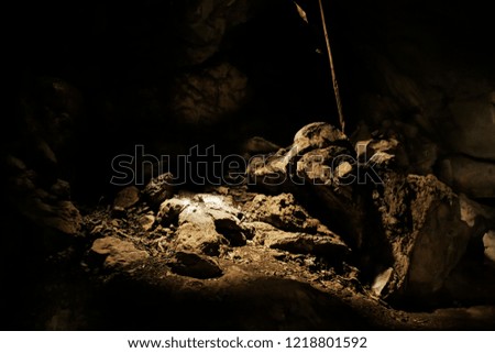 Rock in the cave, Stone background, Abstract dark background.