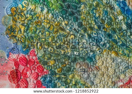 background texture; pattern. Cloth with glued lace stripes. Multicolored lace with sparkles; cording and metallic embroidery. Beautiful traditional lace for design