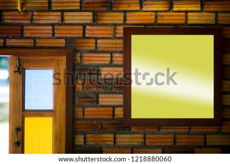 
Brick wall and picture frame