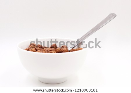 Breakfast cereal - chocolate puffed grain
 Royalty-Free Stock Photo #1218903181