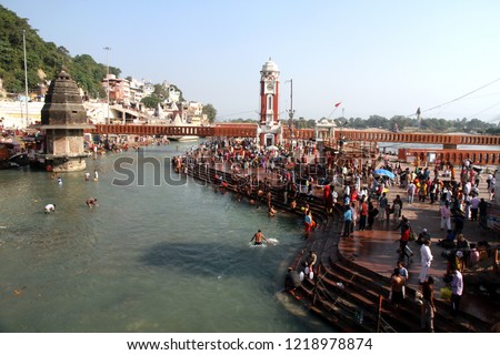 Hindu devotees take a dip in the water of the Ganges at Har Ki Pauri in Haridwar, India.  The place is considered very auspicious.
 Royalty-Free Stock Photo #1218978874
