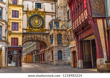old cozy street in Rouen with famos Great clocks or Gros Horloge of Rouen, Normandy, France with nobody Royalty-Free Stock Photo #1218983224