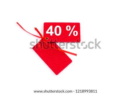 Discounted sales tags or labels isolated on white background. Copy space. Close-up.