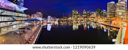 Dark blue panorama of Darling Harbour Cockle bay with surrounding high-rise buildings of urban architecture of modern city SYdney, Australia. Royalty-Free Stock Photo #1219090639